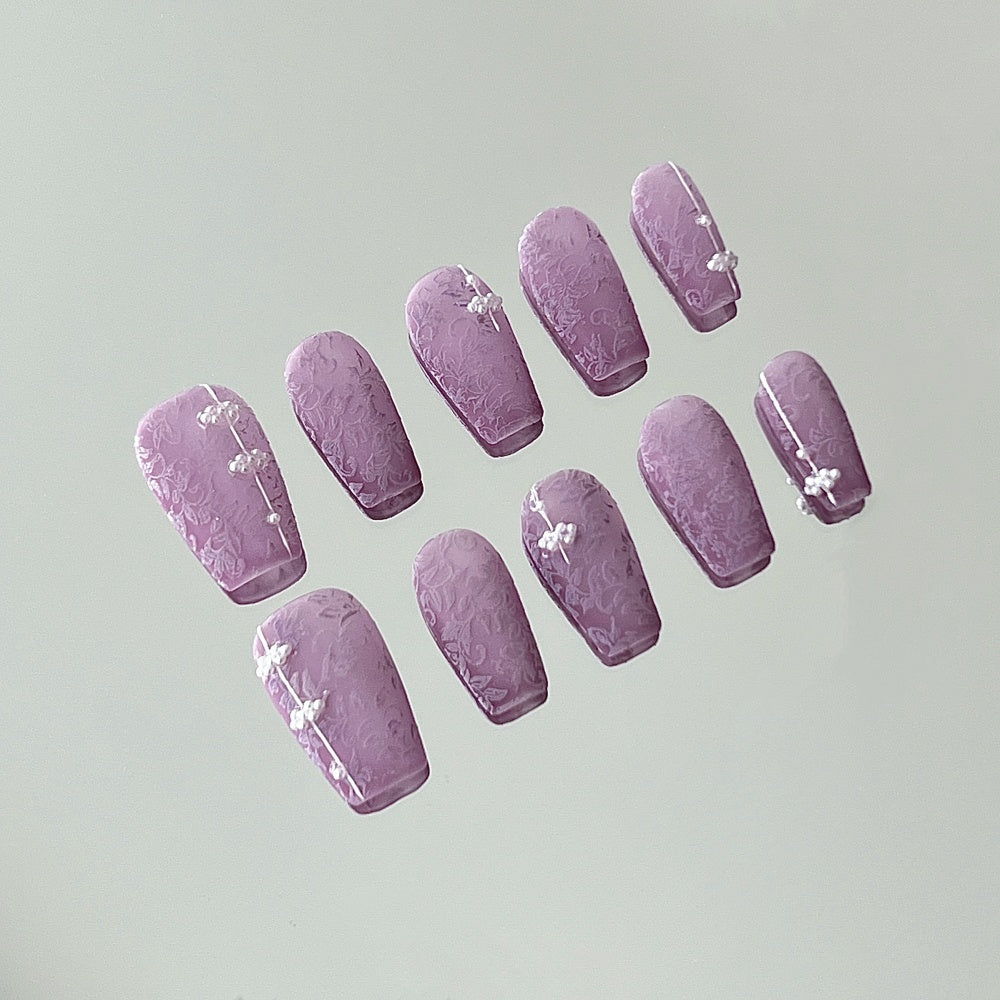 Minimalist Wisteria Pearl Nails – Subtle Knot Embossed Matte Tips